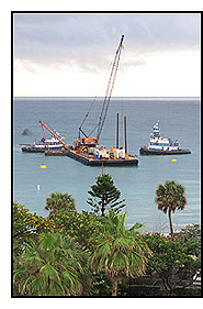 A barge sits offshore